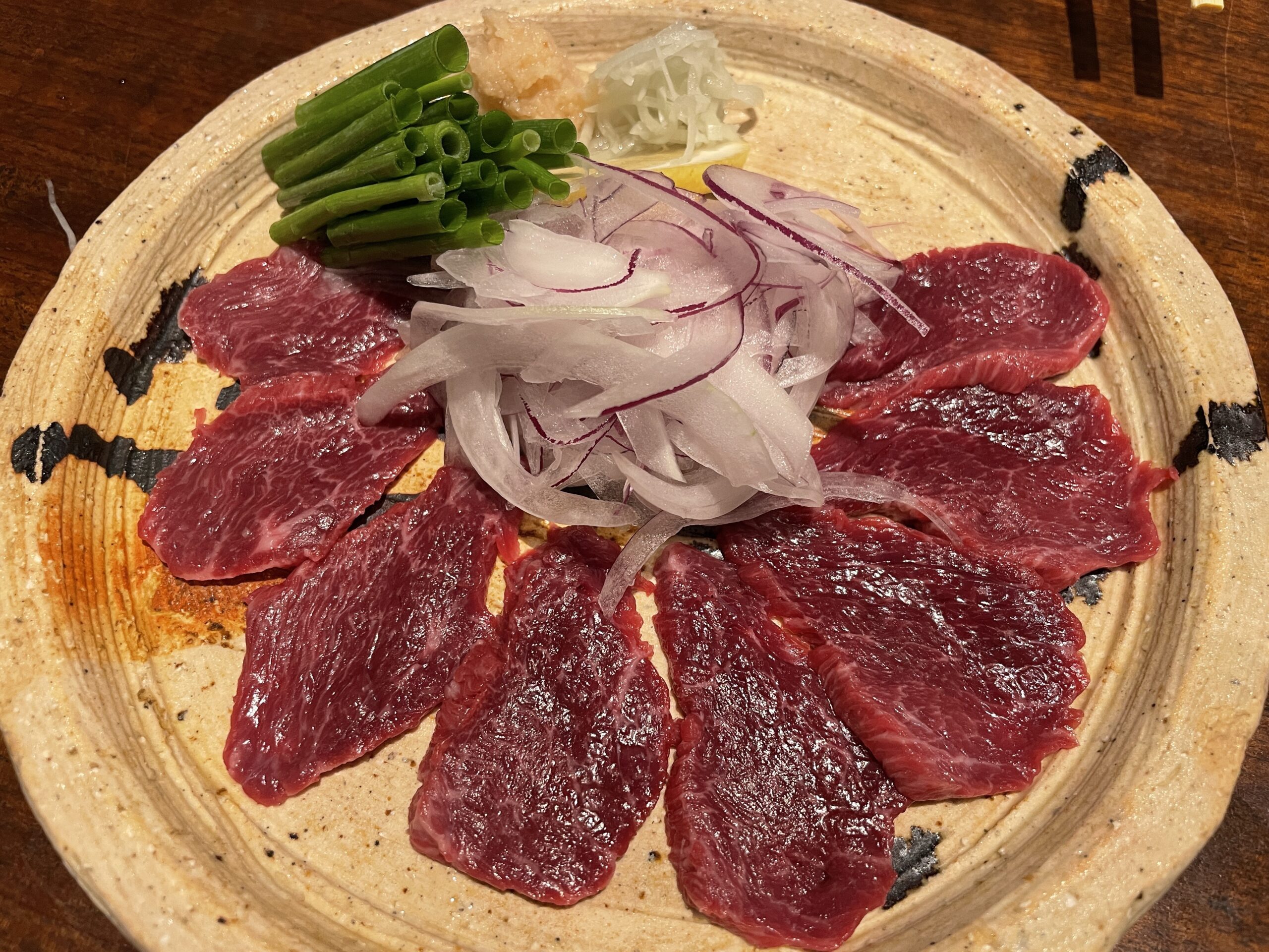 Rohes Pferdefleisch - eine Delikatesse in Kumamoto